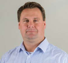 Portrait of Randy Miloszewski, VP of Finance at H&R Mechanical